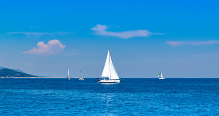 Fototapeta premium Racing sail boats at mediterranean sea. Lucury holidays concept