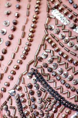 Fabric with sequins and sequins of bright colors. Fashion glitter fabric, sequins. Shiny surface