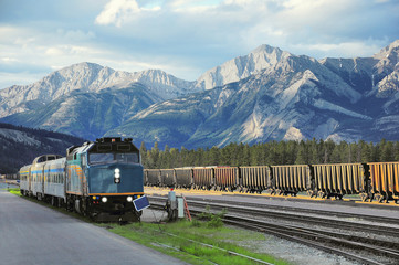 Passenger train stands on Jasper station. Canada.