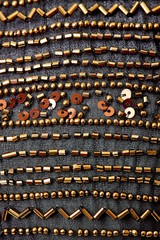 Fabric with sequins and sequins of bright colors. Fashion glitter fabric, sequins. Shiny surface