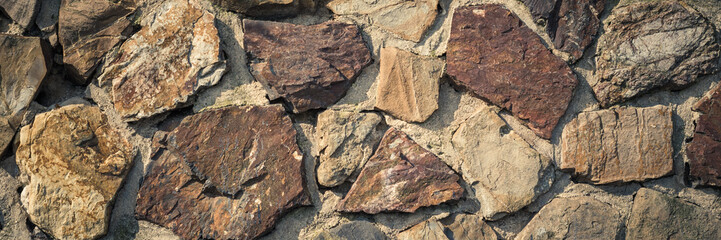 old wall of stone cobblestones. artistic architectural design