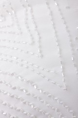 Fabric with sequins and sequins of bright colors. Fashion glitter fabric, sequins. Shiny surface