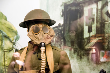 Soldier with a gas mask on in a museum