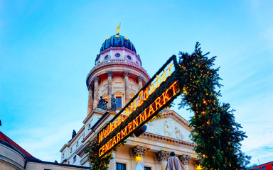 Night Christmas Market of Gendarmenmarkt in Winter Berlin, Germany. German street Xmas and holiday fair. Advent Decoration and Stalls with Crafts Items on the Bazaar. © Roman Babakin