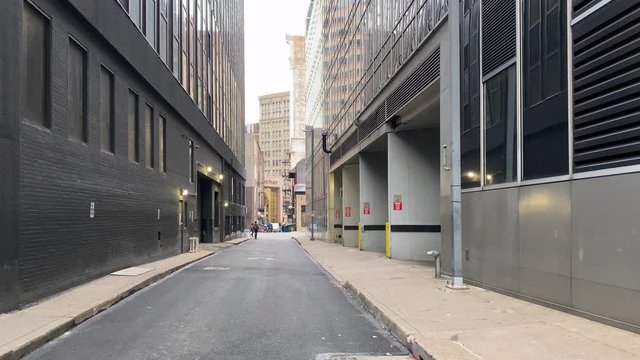 A wide view background plate of an empty city alley. Shot at 60fps.  	