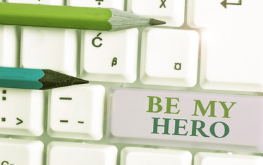 Writing note showing Be My Hero. Business concept for Request by someone to get some efforts of...