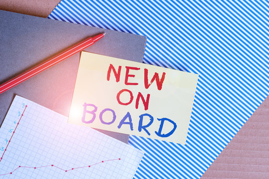 Conceptual hand writing showing New On Board. Concept meaning Welcome to the team Adaptation Collaboration Someone hired Striped paperboard cardboard office study supplies chart