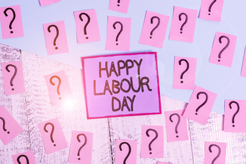 Handwriting text Happy Labour Day. Conceptual photo annual holiday to celebrate the achievements of workers Scribbled and crumbling papers with thick cardboard above wooden table
