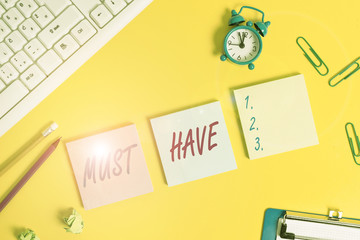 Writing note showing Must Have. Business concept for something modern that analysisy showing want...