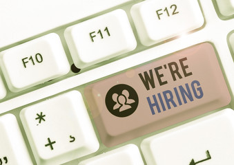 Conceptual hand writing showing We Re Hiring. Concept meaning recently you employ someone or pay...