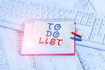 Conceptual hand writing showing To Do List. Concept meaning A structure that usualy made in paper contining task of yours notebook reminder clothespin with pinned sheet light wooden
