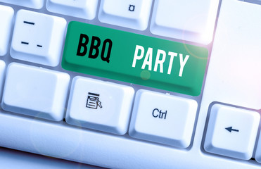 Writing note showing Bbq Party. Business concept for usually done outdoors by smoking meat over wood or charcoal White pc keyboard with note paper above the white background