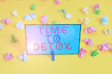Text sign showing Time To Detox. Business photo showcasing Moment for Diet Nutrition health Addiction treatment cleanse Colored crumpled papers empty reminder white floor background clothespin