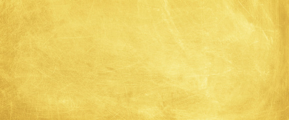 Obraz na płótnie Canvas Gold texture background. Golden scratched surface