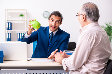Financial advisor giving retirement advice to old man