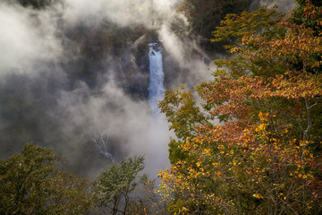 perfect view of kegon waterfall with fog and autumn season in nikko japan