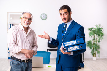 Financial advisor giving retirement advice to old man