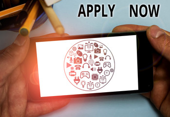 Text sign showing Apply Now. Business photo text An act of a demonstrating to acquire the job...