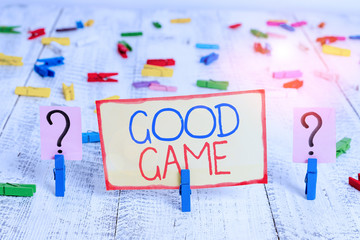 Word writing text Good Game. Business photo showcasing term frequently used in multiplayer gaming at the end of a match Scribbled and crumbling sheet with paper clips placed on the wooden table