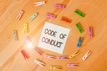 Writing note showing Code Of Conduct. Business concept for Ethics rules moral codes ethical...