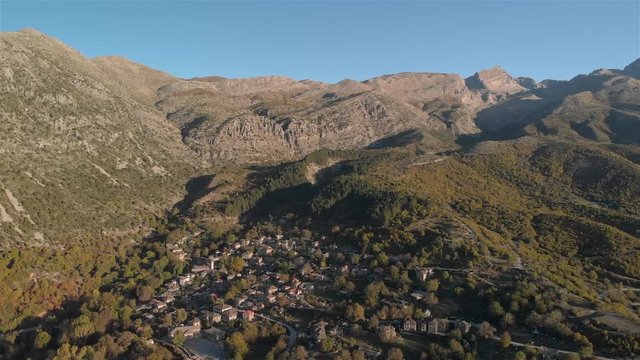 Aerial panoramic shot of Zagorochoria village Tsepelovo Ioannina Greece and Pindus mountains