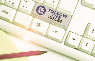 Conceptual hand writing showing Follow The Rules. Concept meaning order someone stick to certain...