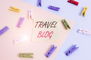 Word writing text Travel Blog. Business photo showcasing Sharing thoughts and experiences of the places around the world Colored clothespin paper empty reminder yellow blue floor background office