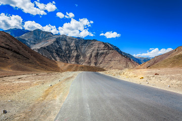 Beautiful Road View with Himalayan Mountains against Blue Sky and Clouds in Leh Ladakh, India