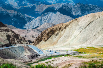 Landscape of Asphalt Road with Colorful Rocky Himalayan Mountains in Leh Ladakh, India