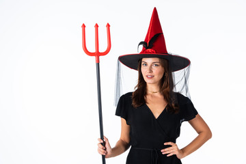 Halloween witch young woman on white background