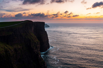 sunset on coast of sea