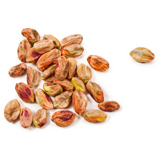 Peeled pistachios isolated on a white background. Top view.