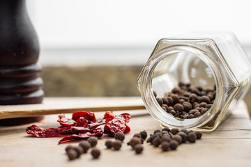 Gourmet ingredients and spices on a wooden table