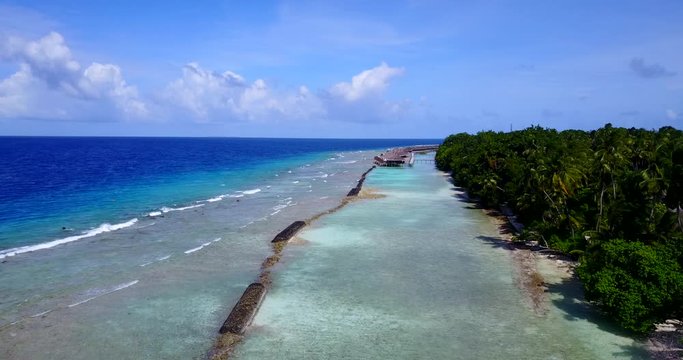 A Beautiful Island Beach Resort In The Maldives Island With An Attraction Of Its Shallow Beach Water, Beautiful And Relaxing Environment, And A Perfect Weather - A Home Away From Home - Aerial Shot
