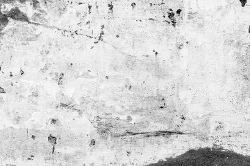 Texture of a concrete wall with cracks and scratches which can be used as a background