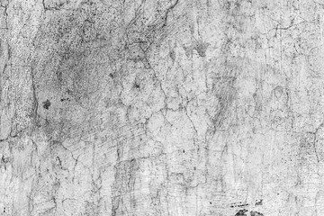 Texture of a concrete wall with cracks and scratches which can be used as a background