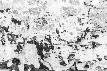 Texture of a concrete wall with cracks and scratches which can be used as a background