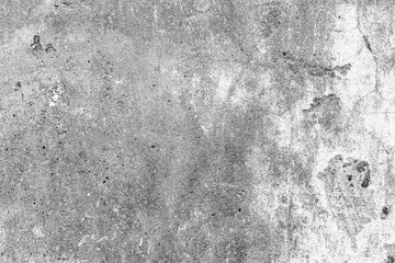 Texture of a concrete wall with cracks and scratches which can be used as a background