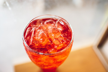 Lemon tea in clear glass, close up from top corner