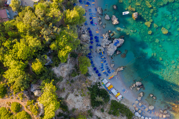 Aerial birds eye view drone photo Anthony Quinn near Ladiko bay on Rhodes island, Dodecanese, Greece. Panorama with nice lagoon and clear blue water. Famous tourist destination in South Europe.