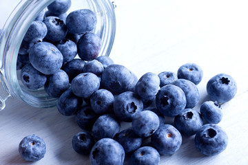 Beautiful blueberries in a glass jar.