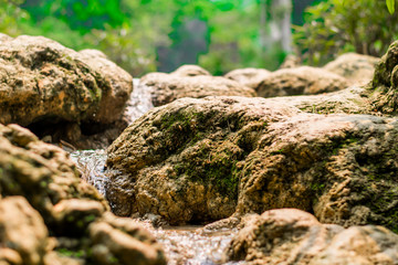 Water flowing through the rocks at Waterfall, Luang Prabang, Laos