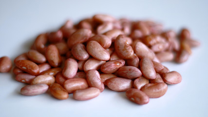 Red kidney bean on white background.