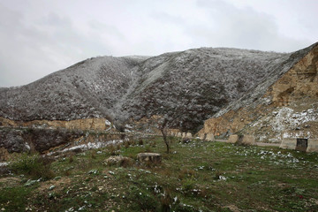 Fototapeta na wymiar Scenic cold landscape of mountain road, Cuacasus mountains near Levashi village, Dagestan, Russia