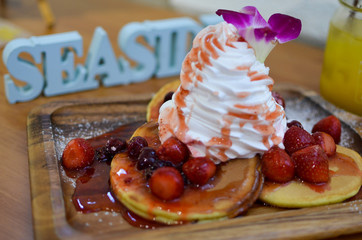 pancakes with ice cream and strawberries