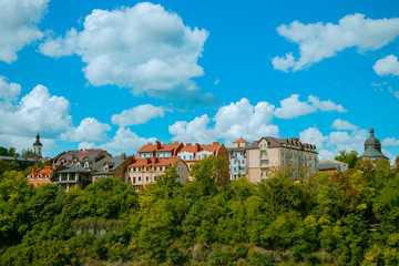 colorful idyllic small European village urban landmark district in park outdoor green ecological area wallpaper pattern photography with empty copy space for your text here 