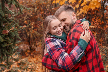 Fototapeta premium Loving young couple in autumn park