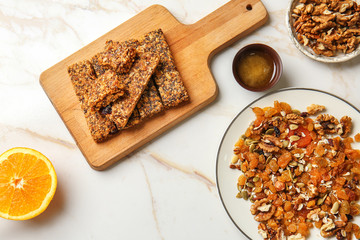 Composition with tasty granola bars on table