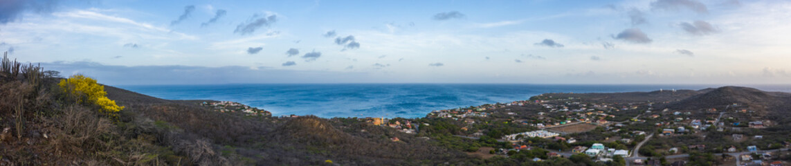 Naklejka na ściany i meble Aerial view over coast of Curaçao / Caribbean Sea around Westpunt