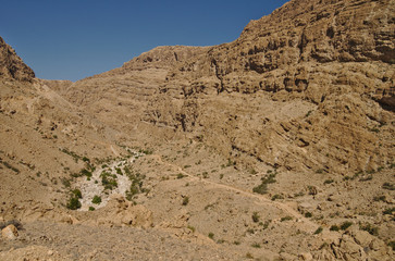Scenic mountain road in rocky landscape of Sultanate of Oman